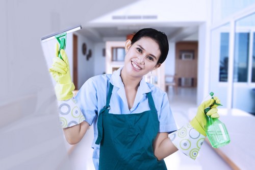 Technician handling carpet cleaning machinery carefully